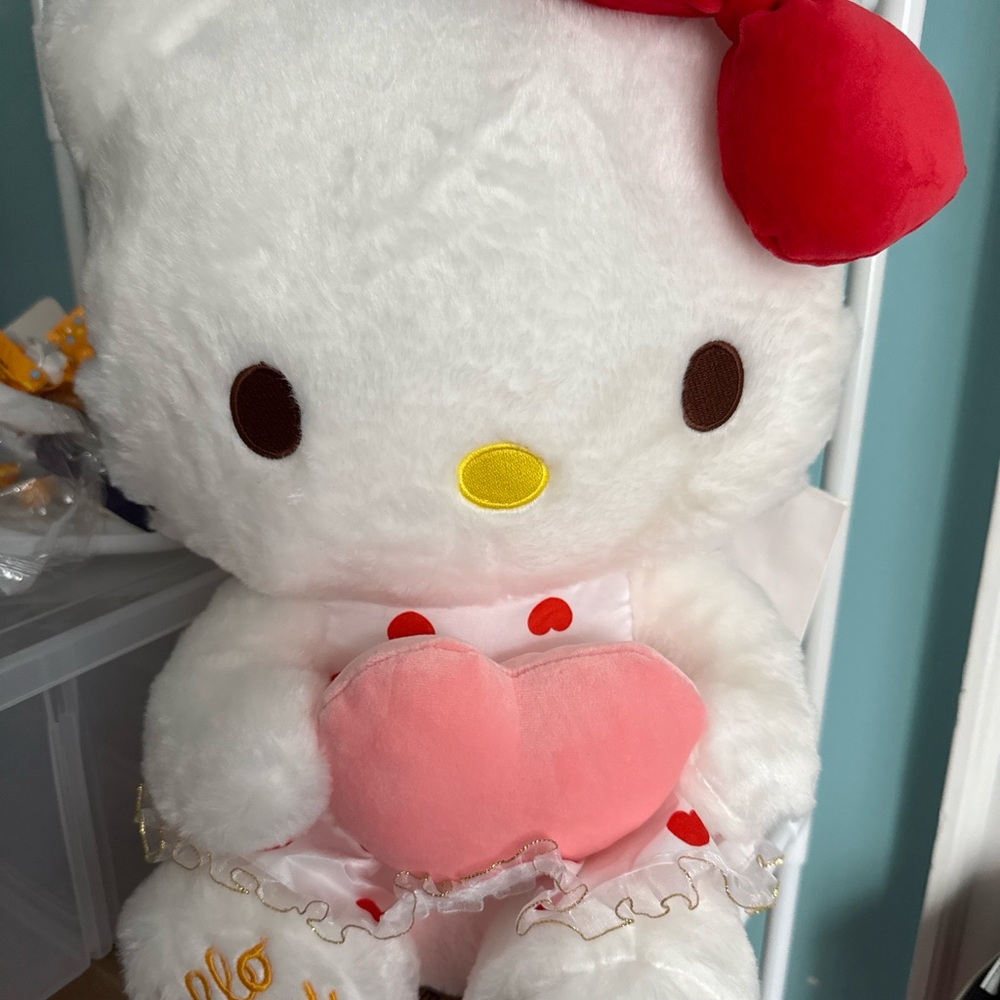 Adorable Plush Toy with Heart and Bow
